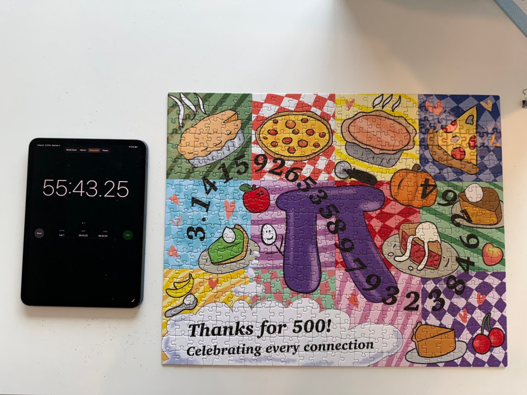 Picture of a custom pi puzzle from speedpuzzling.com with a timer showing 55 minutes 43 seconds